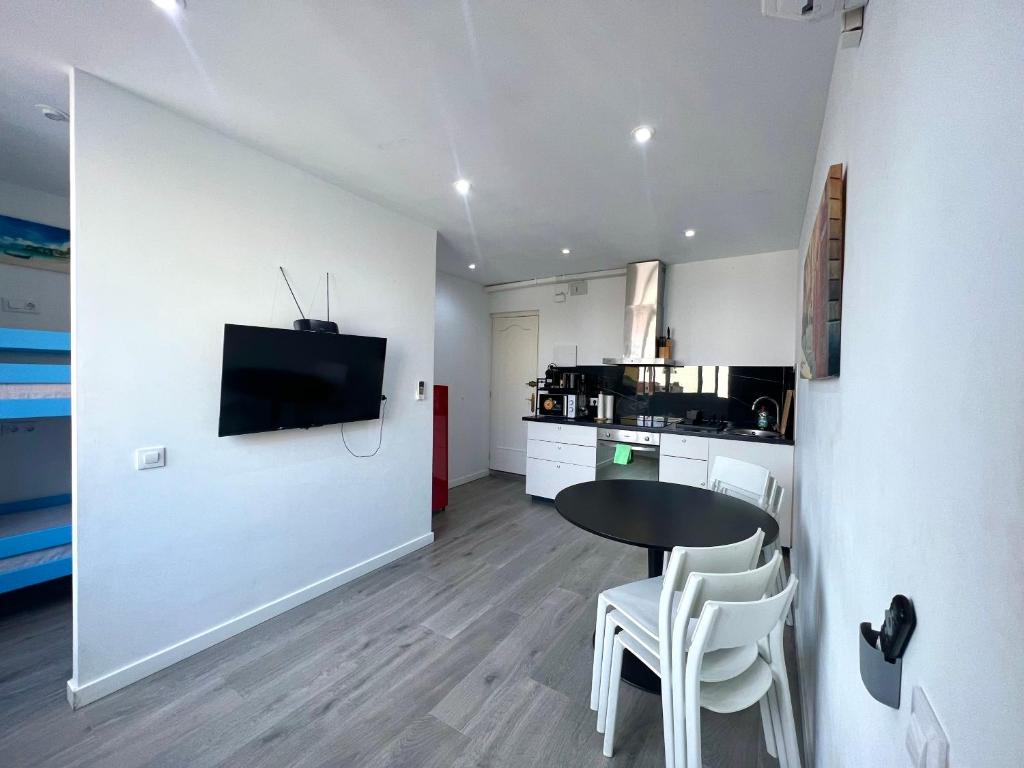 Kuchyň nebo kuchyňský kout v ubytování Apartamentos Playa
