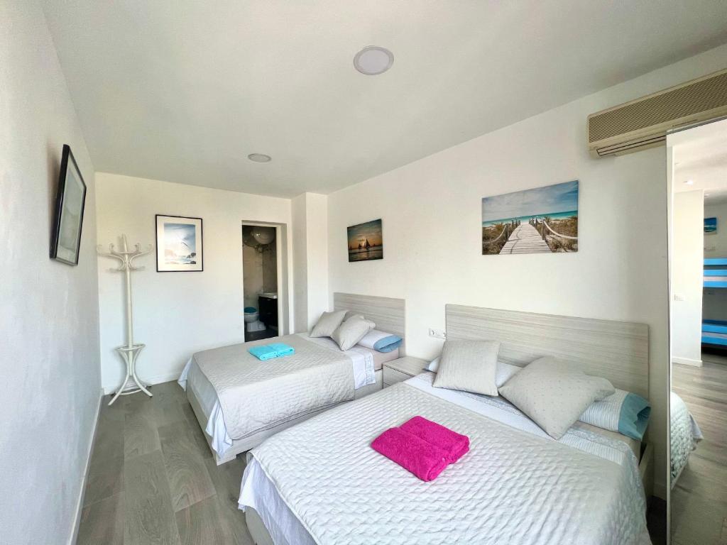 Postel nebo postele na pokoji v ubytování Apartamentos Playa