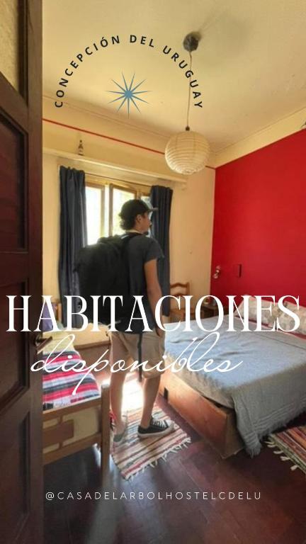 Postel nebo postele na pokoji v ubytování Casa del arbol hostel