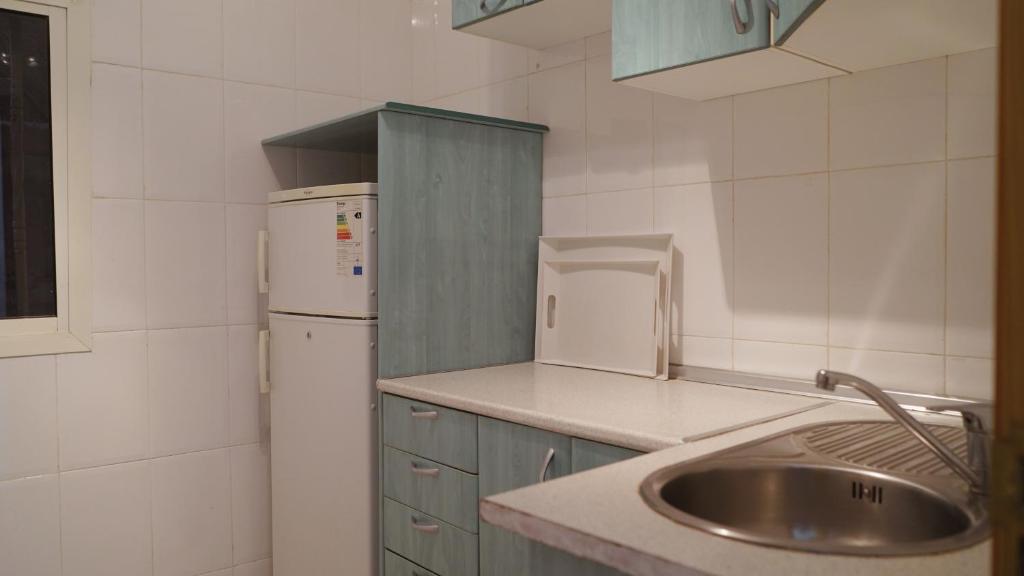 Kuchyň nebo kuchyňský kout v ubytování Hôtel Prestige