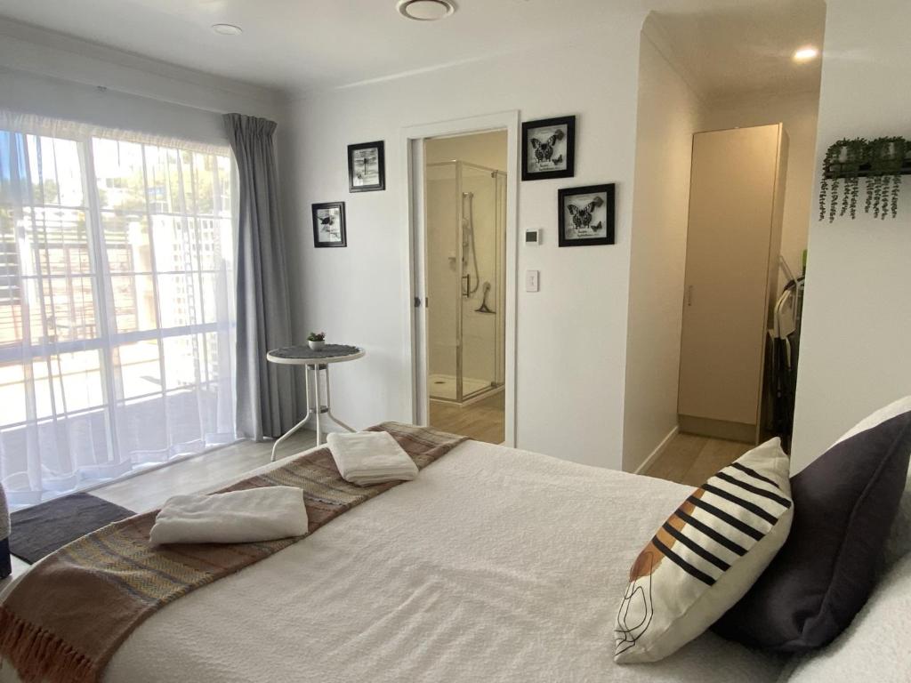 En eller flere senge i et værelse på Fern & Stars