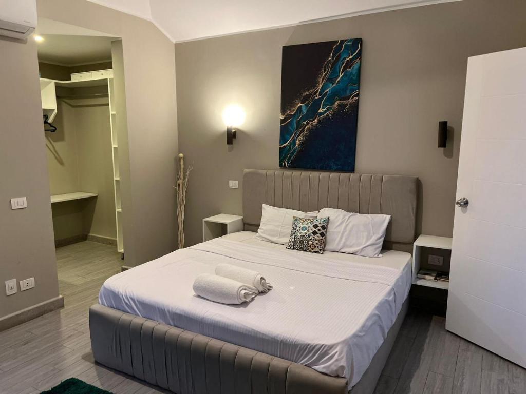 Katil atau katil-katil dalam bilik di Lovely 1BR with Private Heated pool at El-Gouna