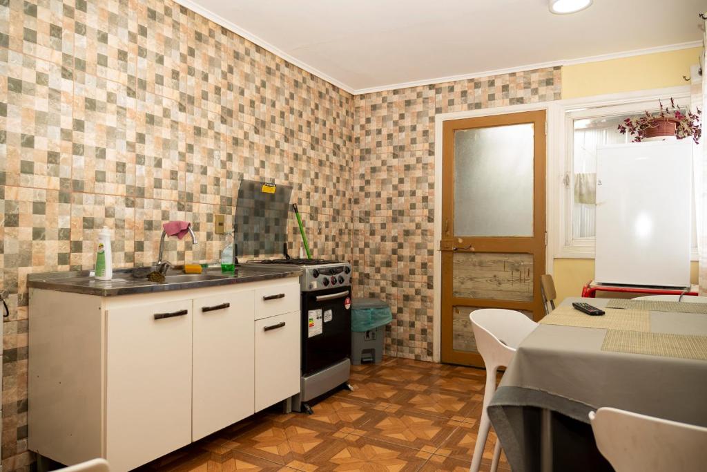 Kuchyň nebo kuchyňský kout v ubytování Hostal Del Tuto