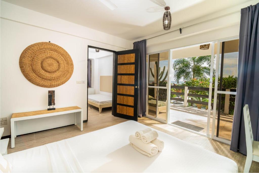 Postel nebo postele na pokoji v ubytování Blanco Beach Resort Malapascua