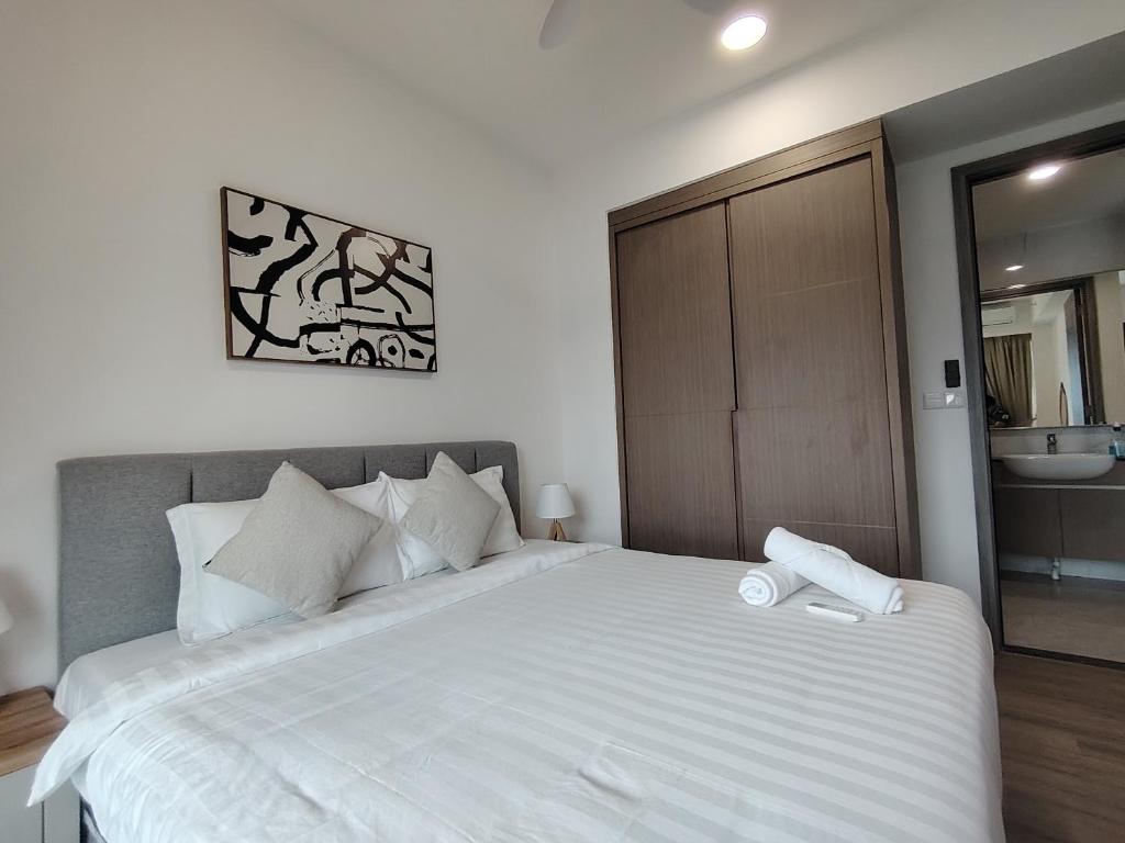 Postel nebo postele na pokoji v ubytování Agile Luxury Suite At TRX KLCC
