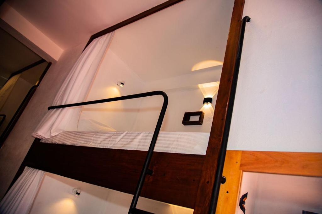 Postel nebo postele na pokoji v ubytování New Radiant Hostal