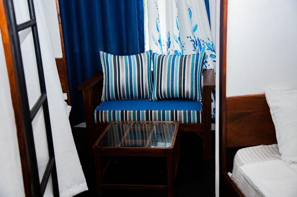 Postel nebo postele na pokoji v ubytování New Radiant Hostal