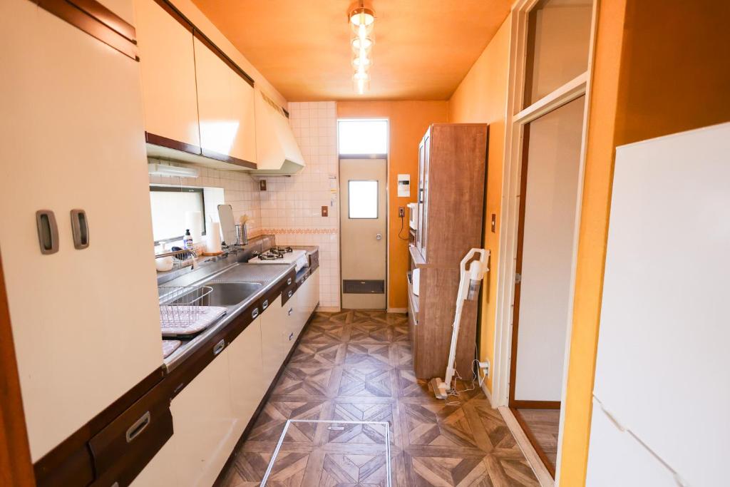 Kuchyň nebo kuchyňský kout v ubytování Sakuradai House