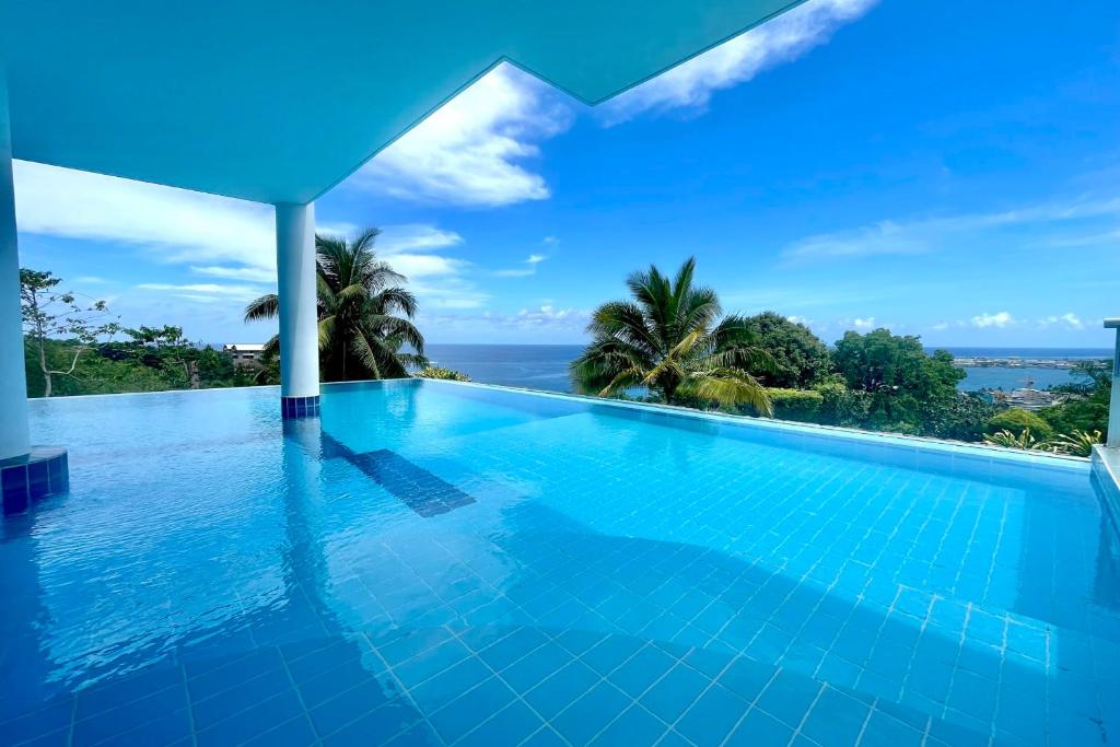 Bazén v ubytování Studio Sunny - pool - wifi - AC Papeete nebo v jeho okolí
