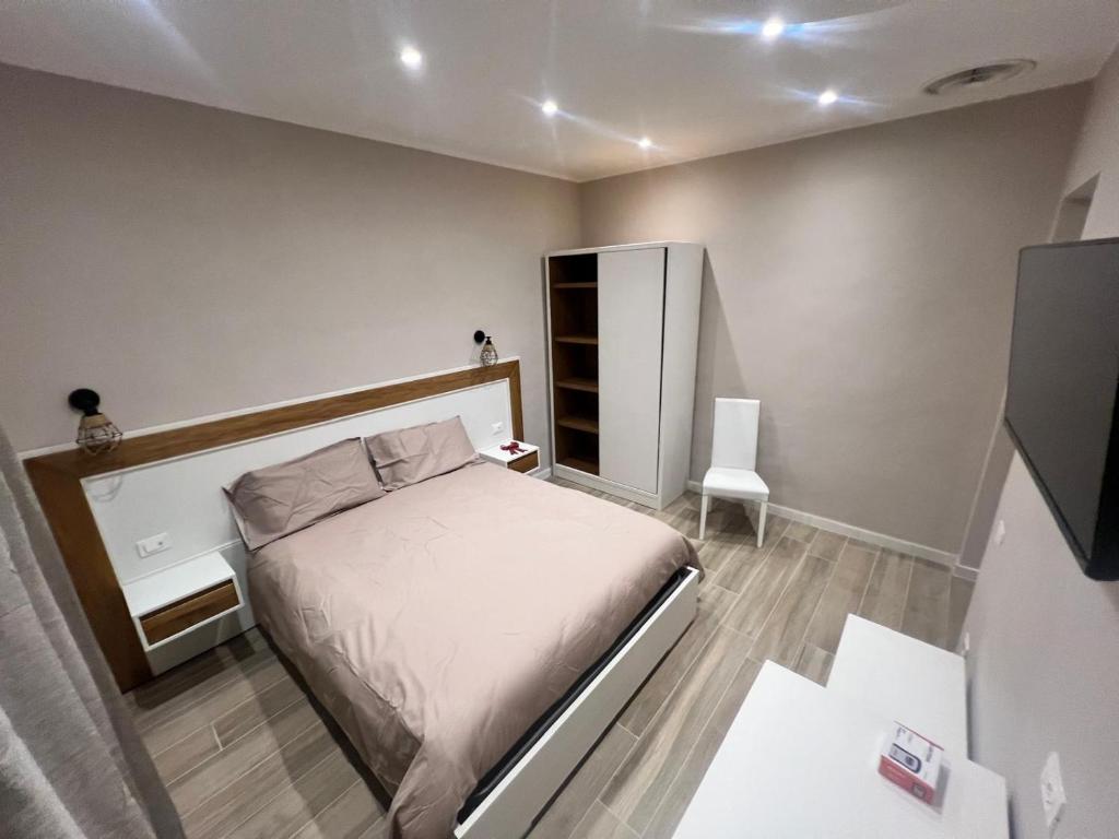 Postel nebo postele na pokoji v ubytování Matera in Centro Rooms