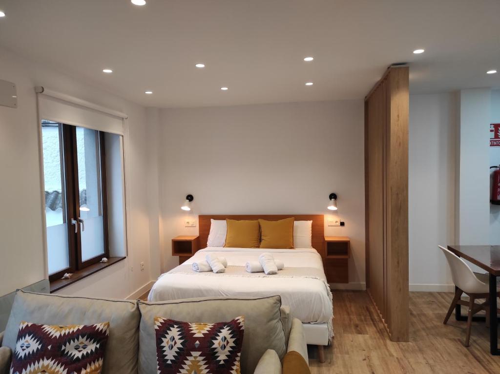 Postel nebo postele na pokoji v ubytování Apartamentos la Garita - El Taller - Cudillero