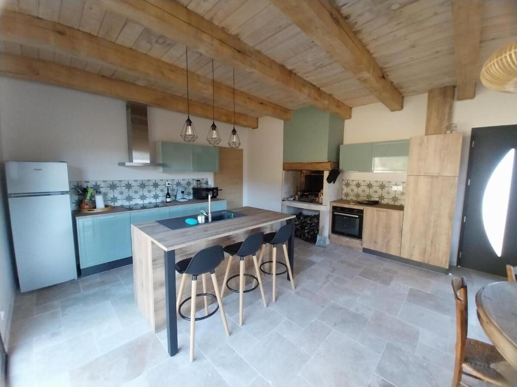 Eldhús eða eldhúskrókur á Gîte Au point de Vue