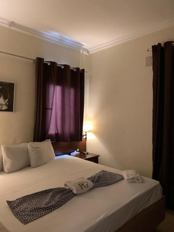 Postel nebo postele na pokoji v ubytování Montana Hotel
