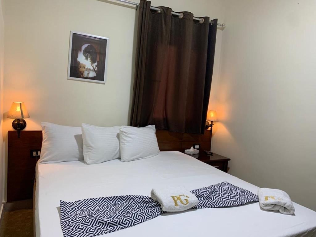 Postel nebo postele na pokoji v ubytování Montana Hotel