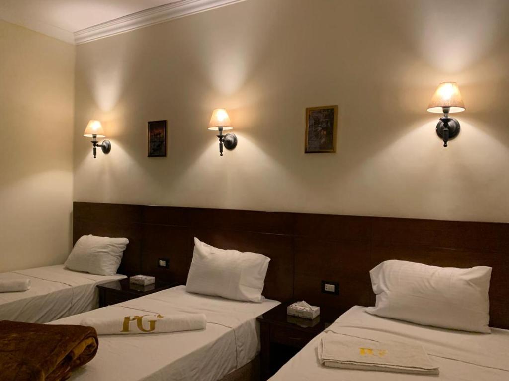 Postel nebo postele na pokoji v ubytování Montana Hotel