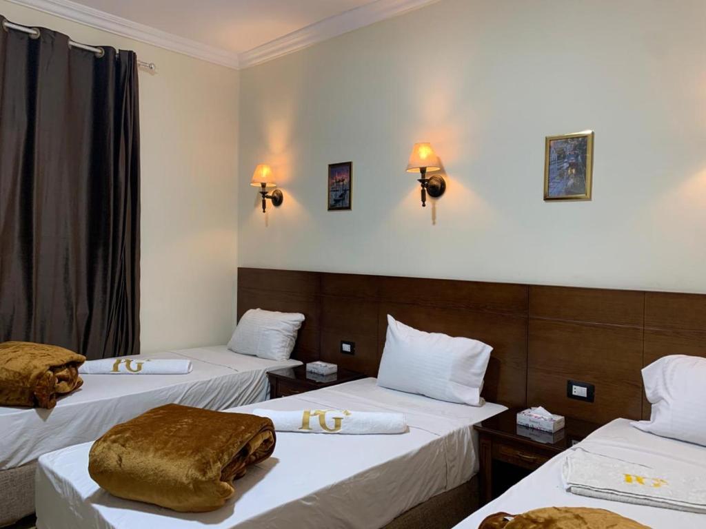 Postel nebo postele na pokoji v ubytování Montana Hotel