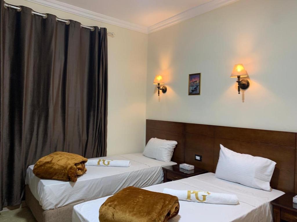 Postel nebo postele na pokoji v ubytování Montana Hotel