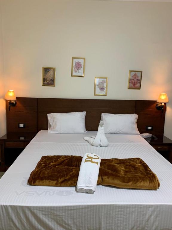 Postel nebo postele na pokoji v ubytování Montana Hotel