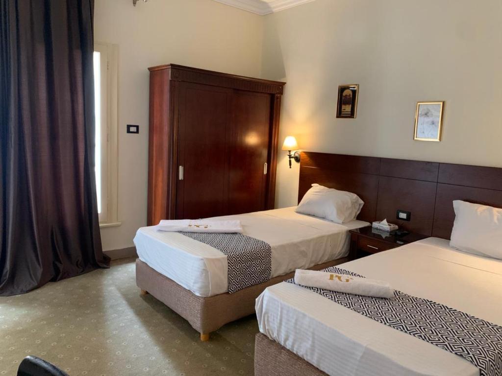 Postel nebo postele na pokoji v ubytování Montana Hotel