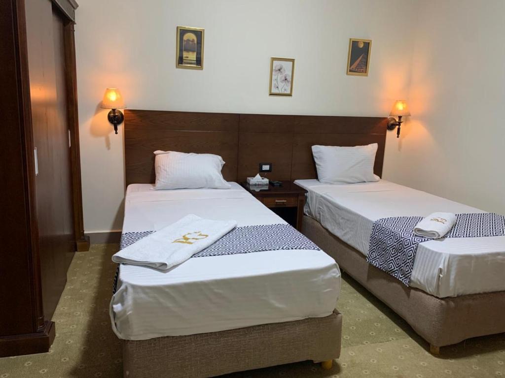 Postel nebo postele na pokoji v ubytování Montana Hotel