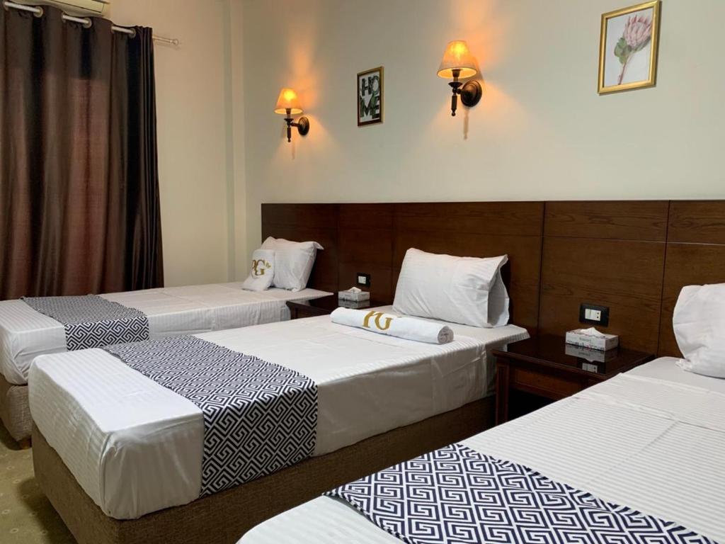 Postel nebo postele na pokoji v ubytování Montana Hotel