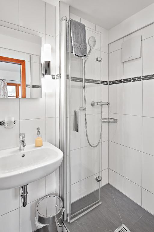 Koupelna v ubytování Hotel Garni Alte Säge Ruhpolding