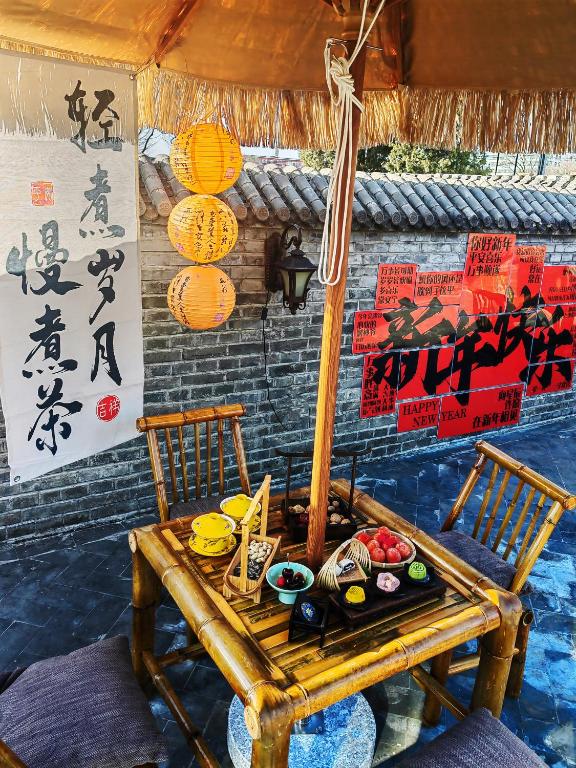 Fotografie z fotogalerie ubytování Hotel Cote Cour Deductive Beijing - Quadrangle close to Tiananmen Square & Forbidden City & Nanluoguxiang, Walk to Wangfujing, English speaking, Free WiFi, Free Laundry, Free Wonton & Noodles with Tour ticket service, Free selfies with ancient costume v Pekingu