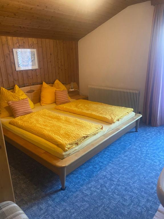 Postel nebo postele na pokoji v ubytování Haus Holaus Helga