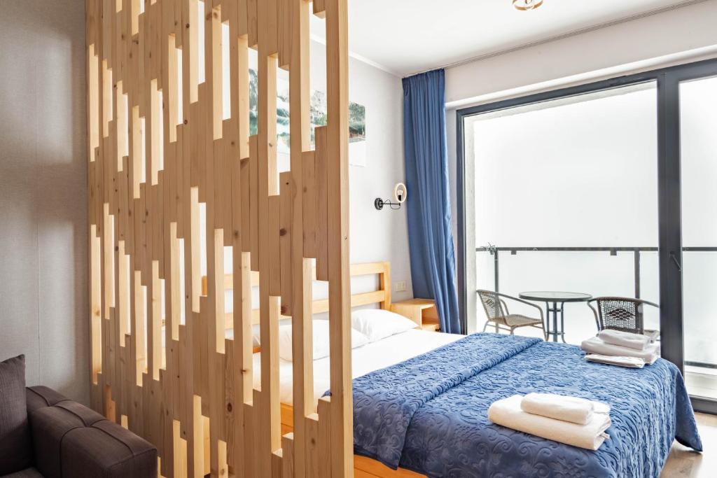 Postel nebo postele na pokoji v ubytování Room310