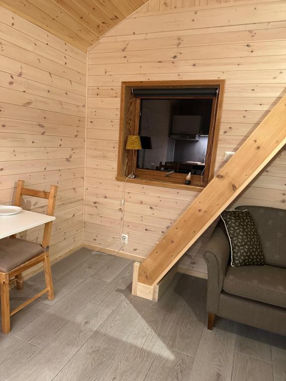 Posezení v ubytování Haugo Utleige Lodge