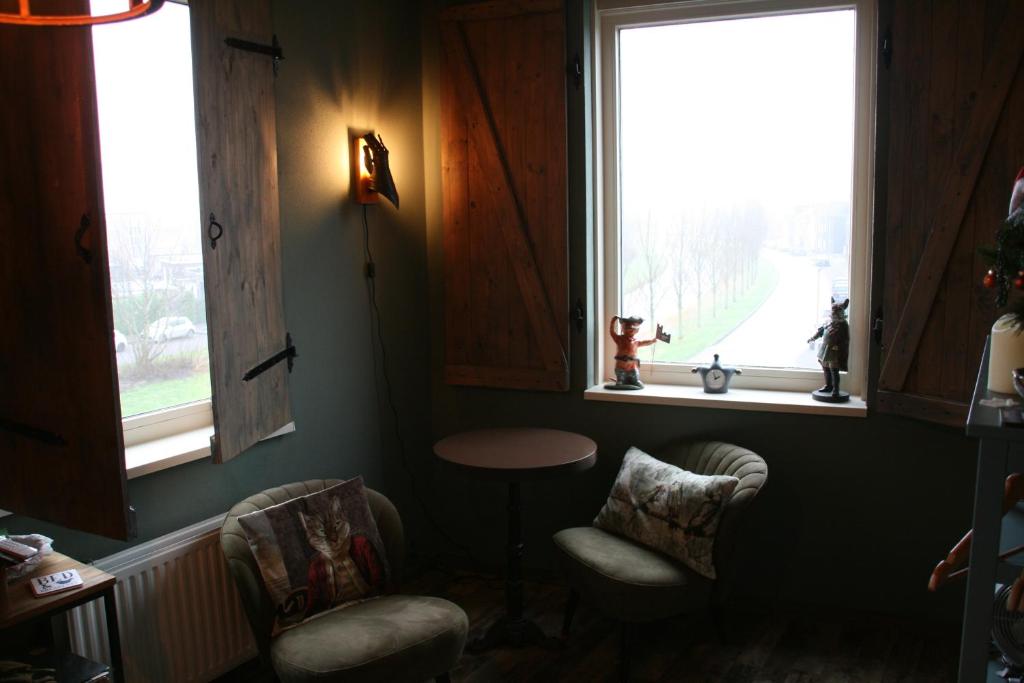 Posezení v ubytování B&B Het kasteel
