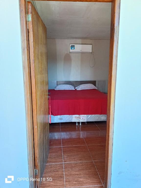 Ліжко або ліжка в номері Hospedaje San Juan del Paraná