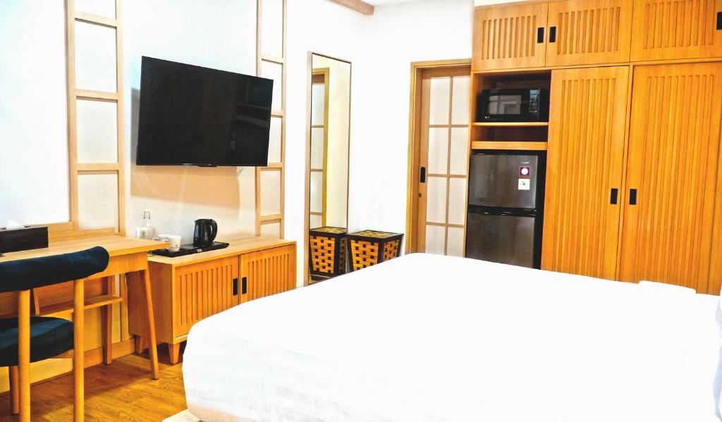 Kuchyň nebo kuchyňský kout v ubytování Jambuluwuk Residence Blok M