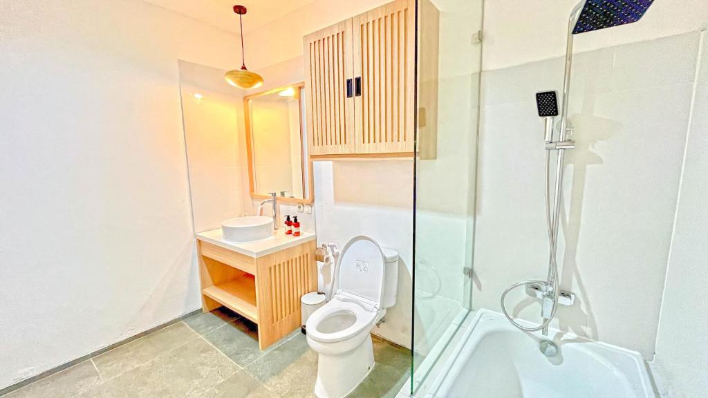 Koupelna v ubytování Jambuluwuk Residence Blok M