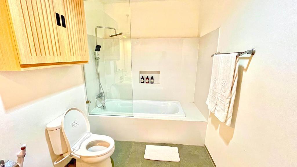 Koupelna v ubytování Jambuluwuk Residence Blok M