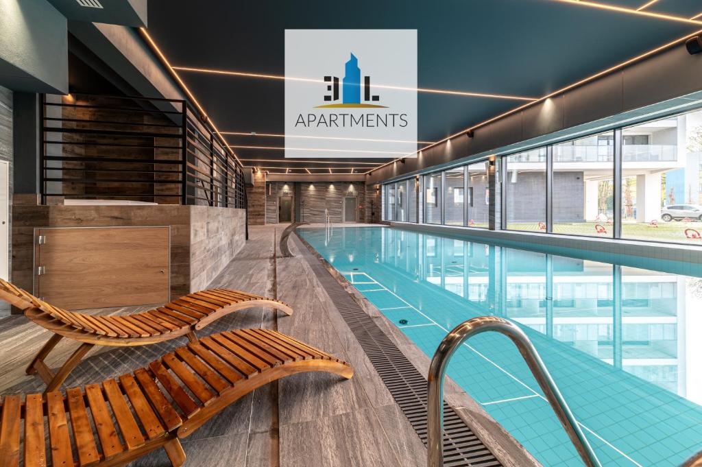 Πισίνα στο ή κοντά στο 3L Apartments Kasprowicza 20C - DARMOWY basen, sauna, siłownia, jacuzzi, bawialnia
