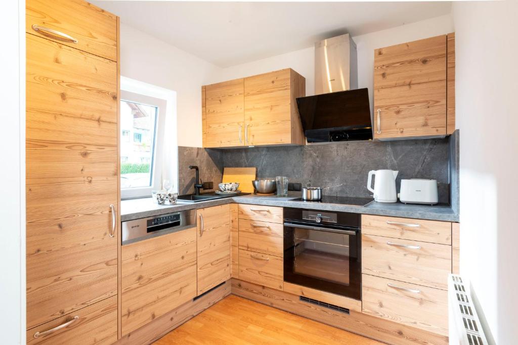Kuchyň nebo kuchyňský kout v ubytování Apartments Sopherl - by myNests