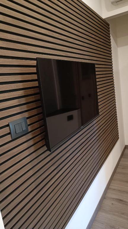 Telewizja i/lub zestaw kina domowego w obiekcie La casa di Ale