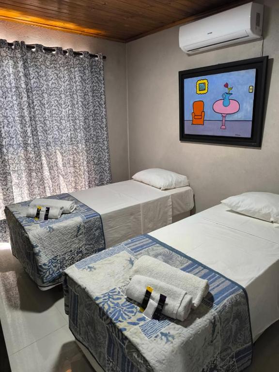 Postel nebo postele na pokoji v ubytování La Posada de Dante