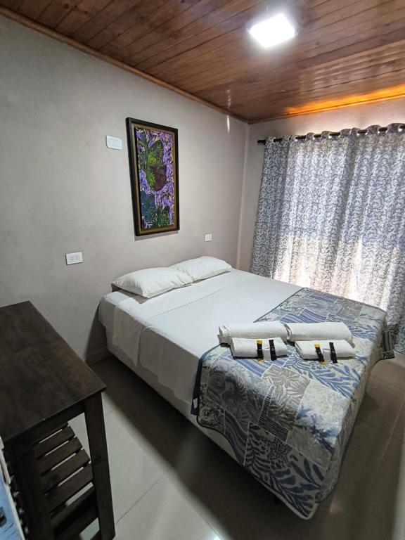 Postel nebo postele na pokoji v ubytování La Posada de Dante