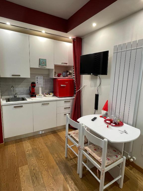 Kuchyň nebo kuchyňský kout v ubytování B&B La Fisarmonica