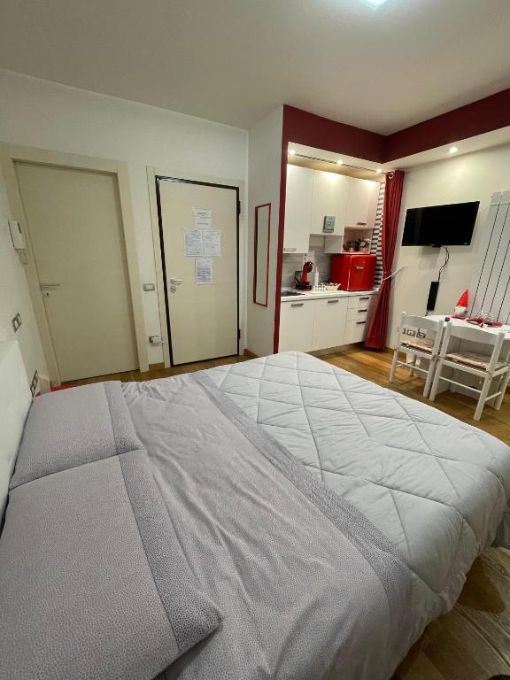 Postel nebo postele na pokoji v ubytování B&B La Fisarmonica