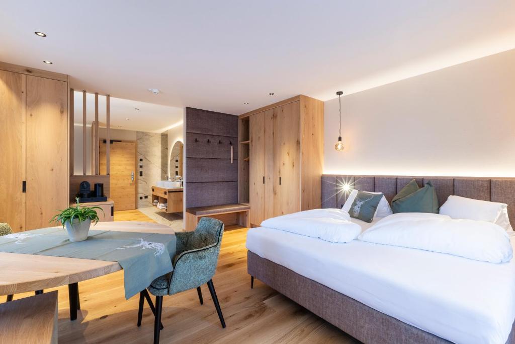 Łóżko lub łóżka w pokoju w obiekcie Hotel Lindnerhof