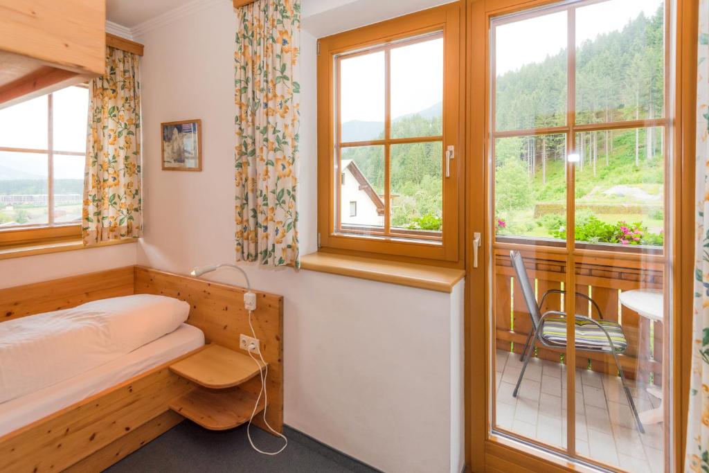 Postel nebo postele na pokoji v ubytování Pension- Appartement Kristall