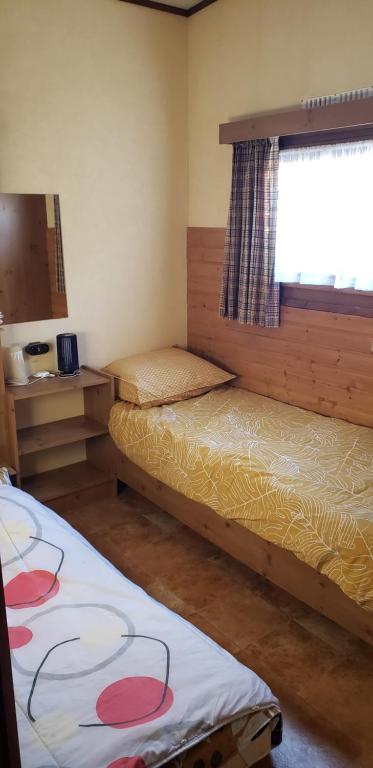 Postel nebo postele na pokoji v ubytování Chalet 176 GRANDE PROMOTION