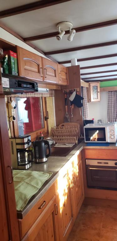 Kuchyň nebo kuchyňský kout v ubytování Chalet 176 GRANDE PROMOTION