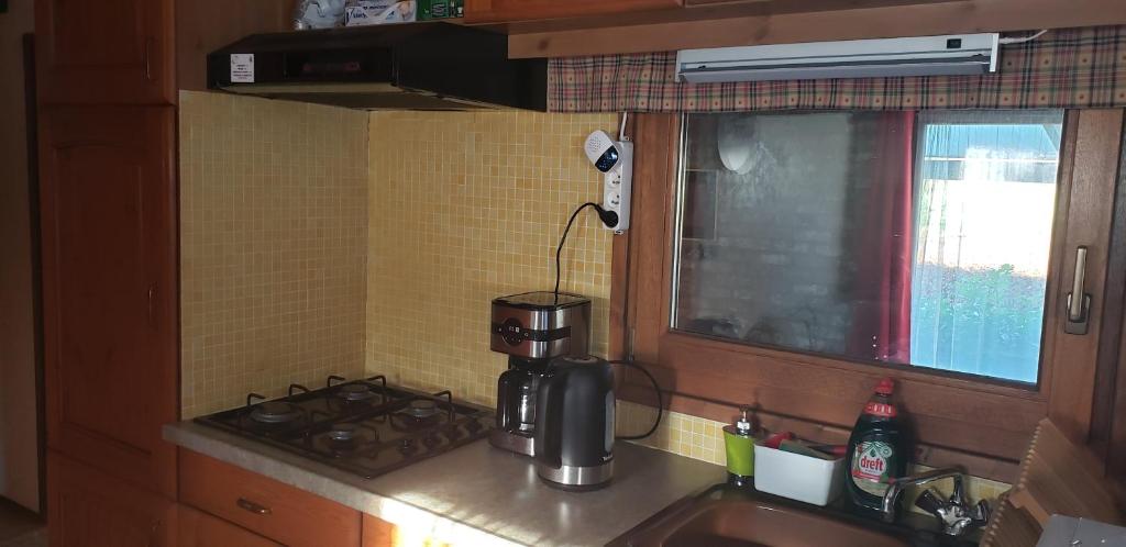 Kuchyň nebo kuchyňský kout v ubytování Chalet 176 GRANDE PROMOTION