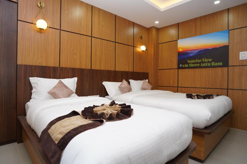 Postel nebo postele na pokoji v ubytování Hotel Faben Inn