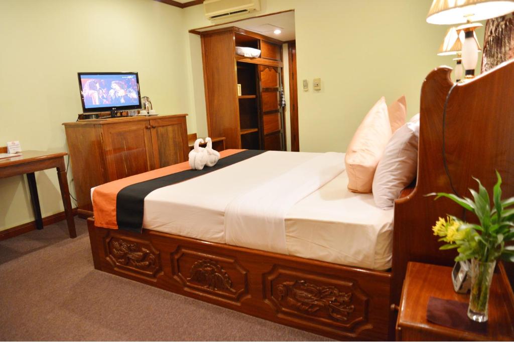 TV a/nebo společenská místnost v ubytování Angkor Hotel