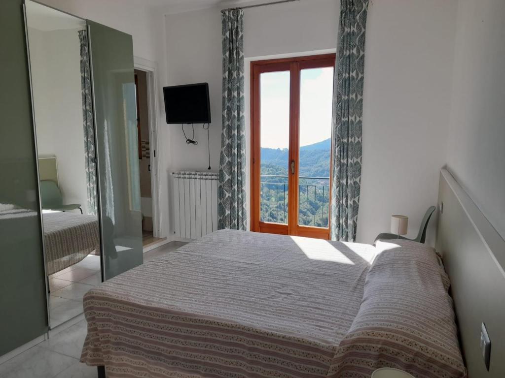 Postel nebo postele na pokoji v ubytování La Casa in Vigna